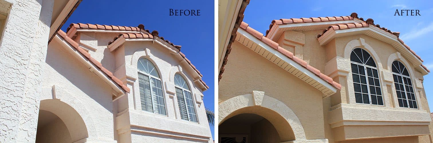 Two-storey red tile roof stucco house with arched windows: open eaves before, white soffit and tan repainted stucco after